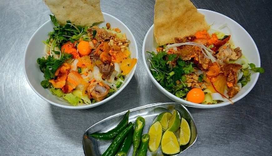 The Quang noodles have a distinct flavor. A bowl of this delicious dish contains noodles, broth, pork and fresh vegetables topped with scallion, cilantro and peanuts. The broth has the sweetness of finely crushed shrimp and the elements on this dish complement each other so well.